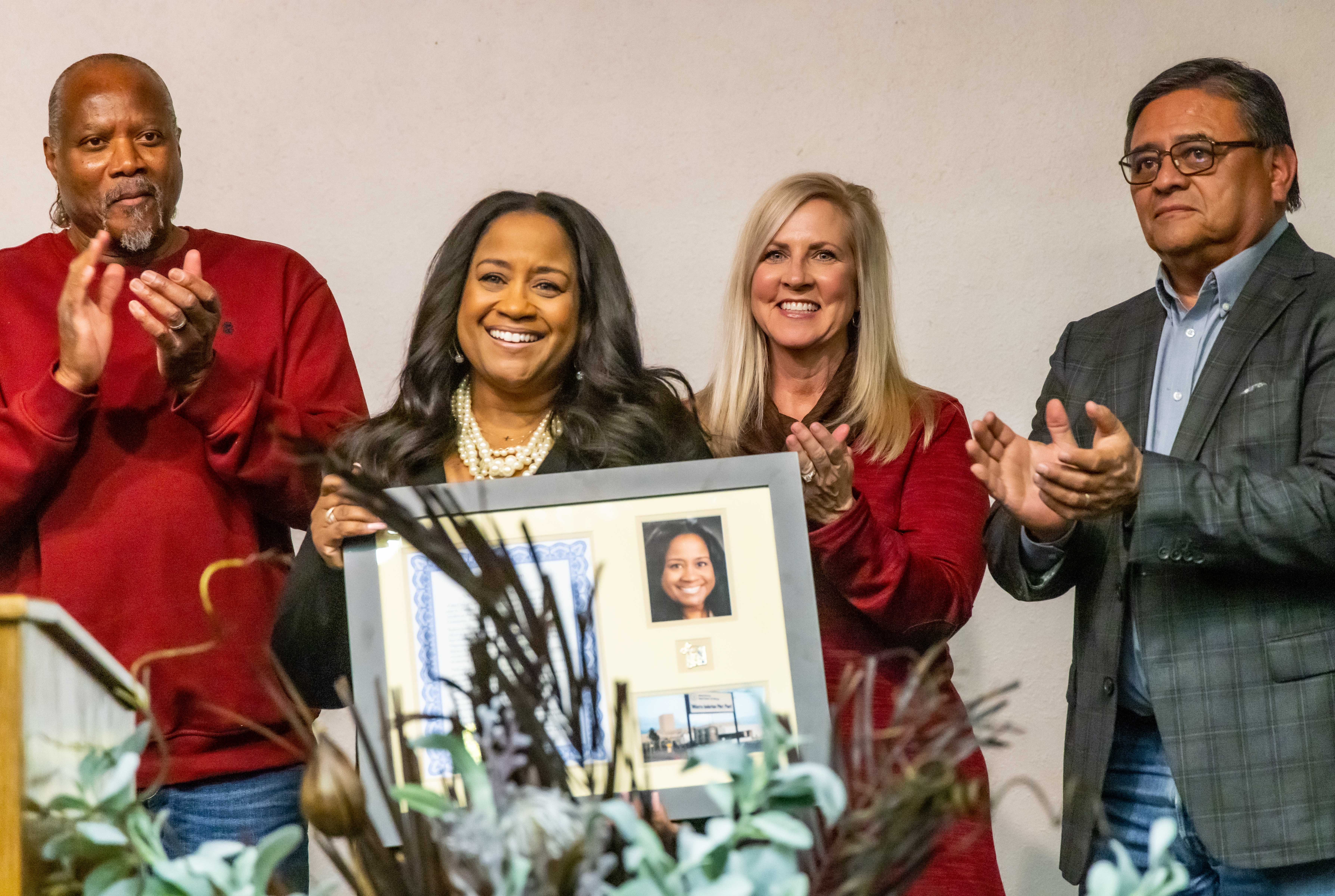 Nicole Nelson-Jean receiving her outstanding honorary citizen award